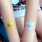 arm-painting-police-badges